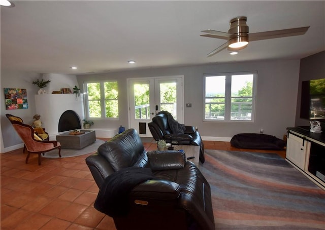 8141 Ward Ln, Rogers, AR 72756 - living area featuring light tile patterned floors, french doors, a ceiling fan, baseboards, and recessed lighting