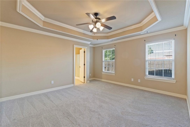 708 Carter Ct, Siloam Springs, AR 72761 - carpeted empty room with a tray ceiling, ornamental molding, ceiling fan, and baseboards