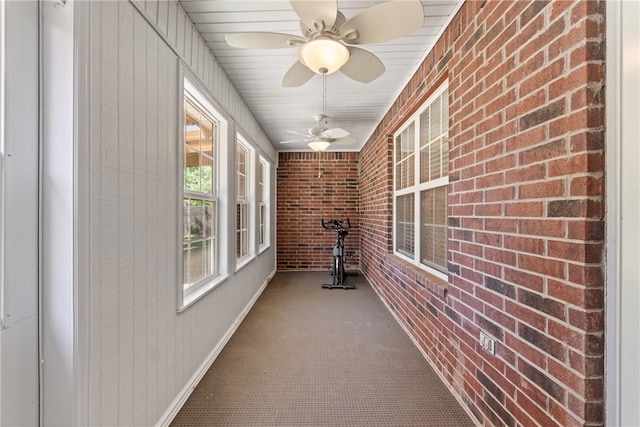708 Carter Ct, Siloam Springs, AR 72761 - unfurnished sunroom featuring ceiling fan