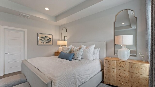 1404 Breeze Ct, Bentonville, AR 72713 - bedroom with a tray ceiling and recessed lighting