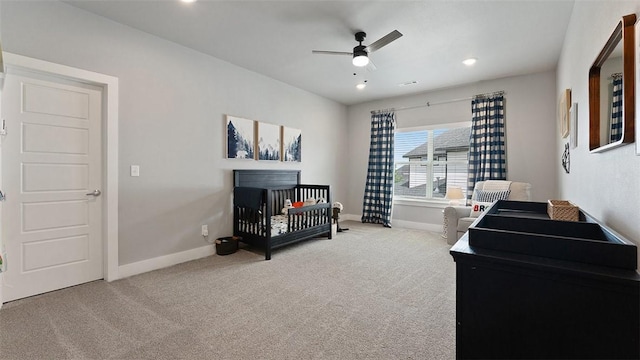 1404 Breeze Ct, Bentonville, AR 72713 - bedroom with carpet floors, baseboards, a crib, and recessed lighting