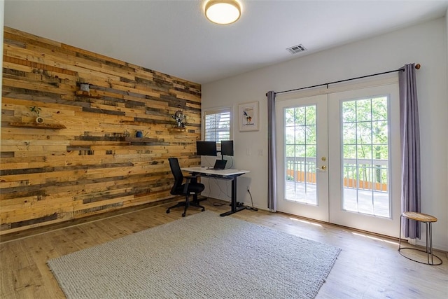 2507 NW Linebarger Ln, Bentonville, AR 72712 - office space featuring french doors, wood finished floors, and wood walls