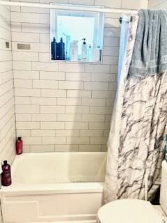 410 E Harvard St, Siloam Springs, AR 72761 - bathroom with toilet and shower / tub combo with curtain