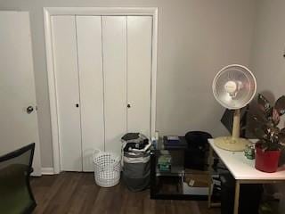 410 E Harvard St, Siloam Springs, AR 72761 - bedroom with dark wood-style floors and a closet