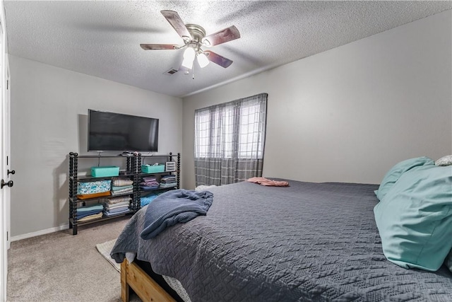 3408 SW Victoria Pl, Bentonville, AR 72712 - bedroom featuring a textured ceiling, carpet flooring, and ceiling fan