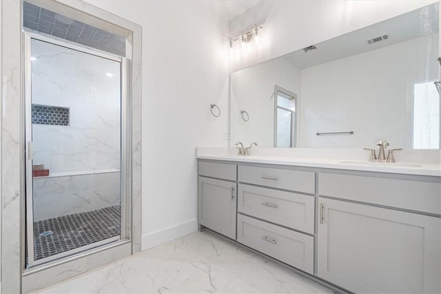 6601 SW Acacia St, Bentonville, AR 72713 - full bathroom featuring marble finish flooring, a marble finish shower, baseboards, and double vanity