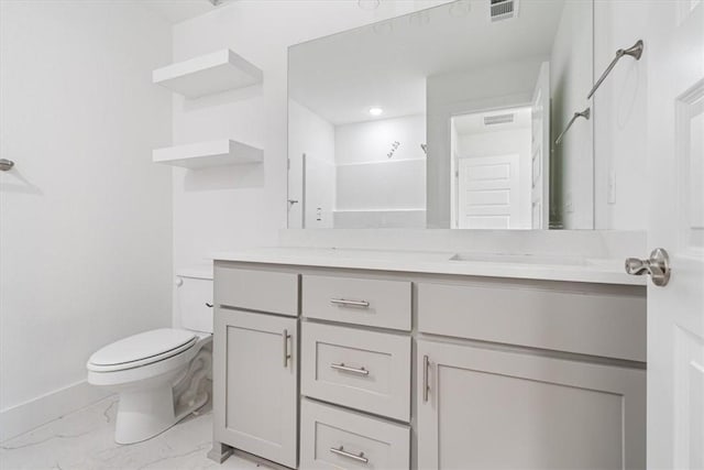 6601 SW Acacia St, Bentonville, AR 72713 - full bathroom with toilet, baseboards, marble finish flooring, vanity, and recessed lighting