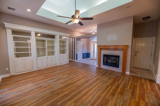 4509 W Highland Knolls Rd, Rogers, AR 72758 - unfurnished living room featuring ceiling fan, wood finished floors, a fireplace, baseboards, and recessed lighting