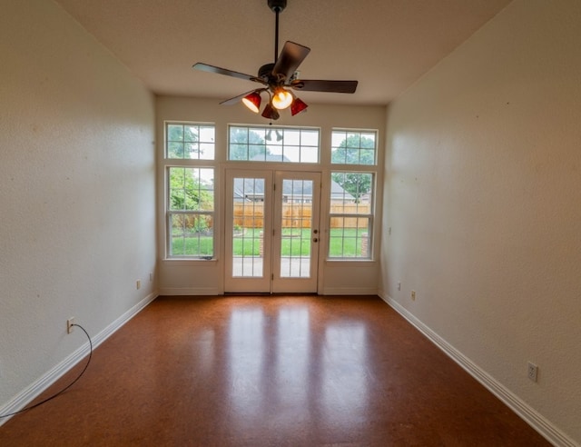 4509 W Highland Knolls Rd, Rogers, AR 72758 - unfurnished room featuring baseboards, a ceiling fan, and a textured wall