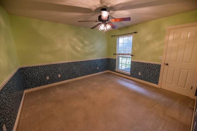 4509 W Highland Knolls Rd, Rogers, AR 72758 - carpeted empty room featuring wainscoting, ceiling fan, and wallpapered walls