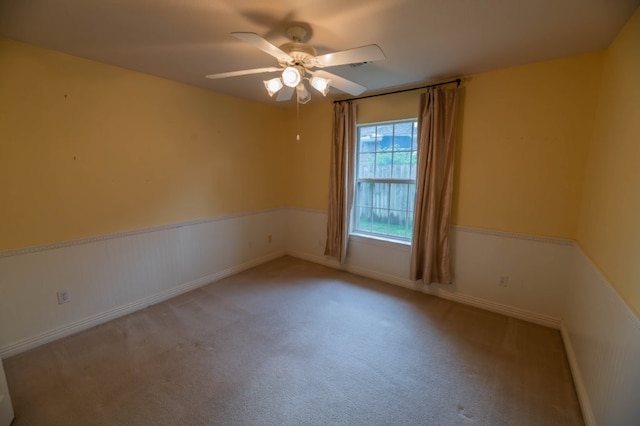 4509 W Highland Knolls Rd, Rogers, AR 72758 - empty room featuring a ceiling fan and carpet flooring