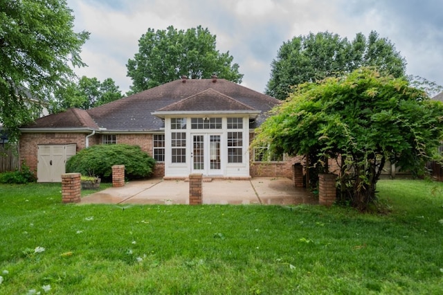 4509 W Highland Knolls Rd, Rogers, AR 72758 - back of house featuring french doors, brick siding, a patio, and a lawn