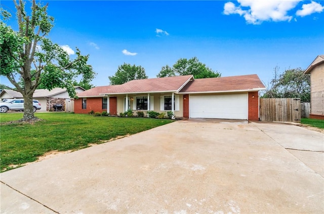 1502 Jennifer St, Springdale, AR 72762 - single story home with a garage, concrete driveway, and brick siding