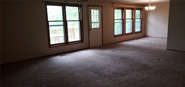8 Mindy Ln, Bella Vista, AR 72715 - carpeted spare room with a chandelier and plenty of natural light