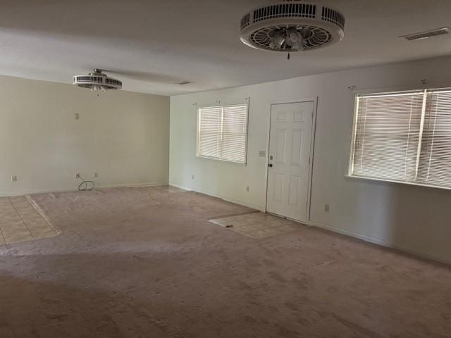 1376 Woods Point Rd, Elizabeth, AR 72531 - foyer entrance featuring carpet floors and baseboards