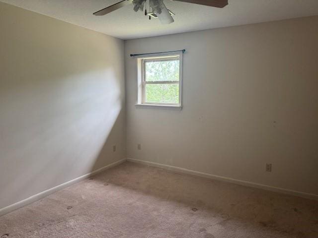 1376 Woods Point Rd, Elizabeth, AR 72531 - carpeted spare room with a ceiling fan and baseboards