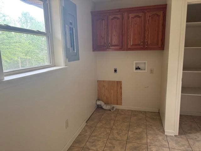 1376 Woods Point Rd, Elizabeth, AR 72531 - laundry area featuring electric dryer hookup, washer hookup, electric panel, and light tile patterned floors