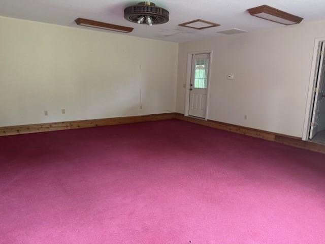 1376 Woods Point Rd, Elizabeth, AR 72531 - unfurnished room with carpet floors and baseboards