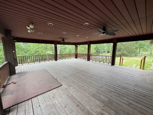 1376 Woods Point Rd, Elizabeth, AR 72531 - wooden deck featuring ceiling fan