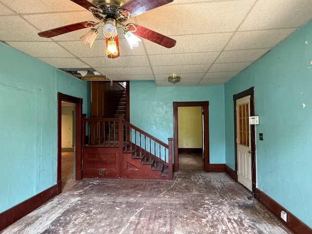 308 Flickinger St, Sulphur Springs, AR 72768 - spare room with a paneled ceiling, stairs, baseboards, and a ceiling fan