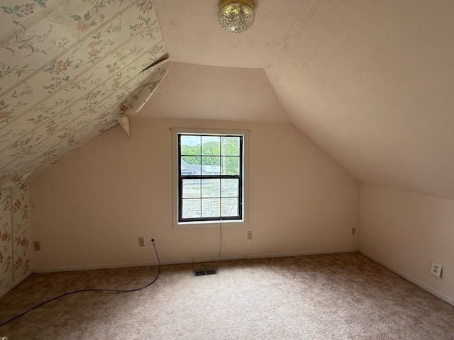 308 Flickinger St, Sulphur Springs, AR 72768 - bonus room featuring vaulted ceiling, carpet floors, and baseboards