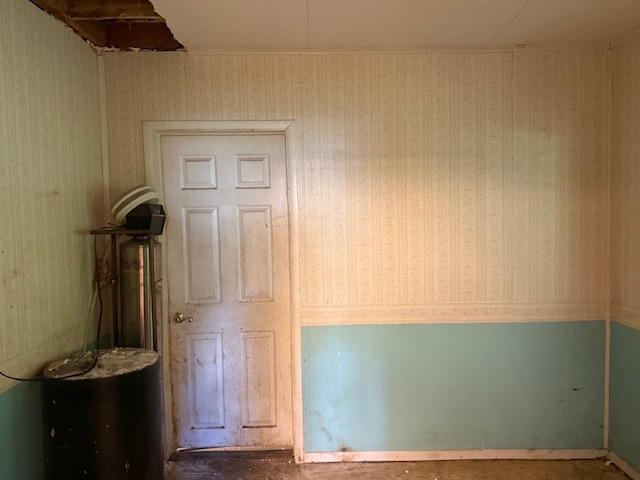 308 Flickinger St, Sulphur Springs, AR 72768 - spare room featuring wallpapered walls