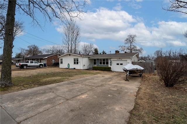 928 S Maple St, Siloam Springs, AR 72761 - single story home with driveway, a garage, and a chimney