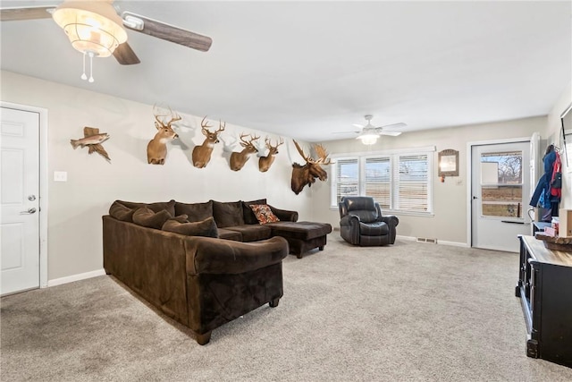 928 S Maple St, Siloam Springs, AR 72761 - living area featuring ceiling fan, carpet, and baseboards