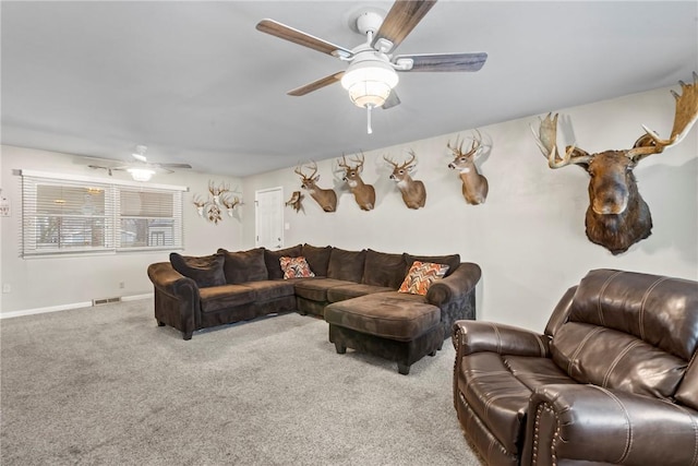 928 S Maple St, Siloam Springs, AR 72761 - carpeted living area featuring a ceiling fan and baseboards
