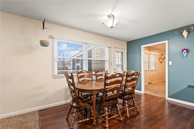 928 S Maple St, Siloam Springs, AR 72761 - dining room with baseboards and dark wood-style flooring