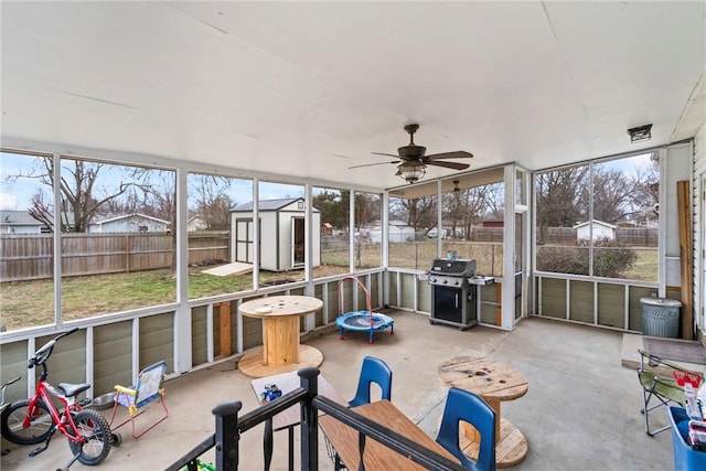 928 S Maple St, Siloam Springs, AR 72761 - sunroom / solarium featuring ceiling fan