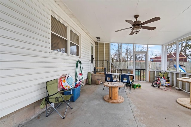 928 S Maple St, Siloam Springs, AR 72761 - sunroom featuring ceiling fan
