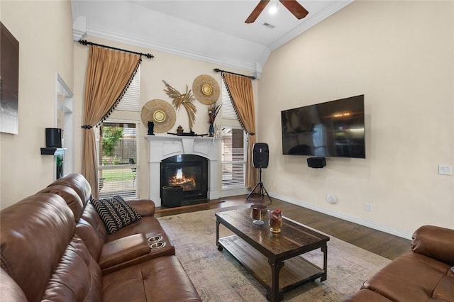 4005 Lyndale Dr, Rogers, AR 72758 - living room with ornamental molding, a ceiling fan, lofted ceiling, wood finished floors, and a glass covered fireplace