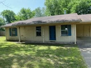 809 Linda St, Prairie Grove, AR 72753 - view of front facade featuring asphalt driveway, an attached carport, and a front yard