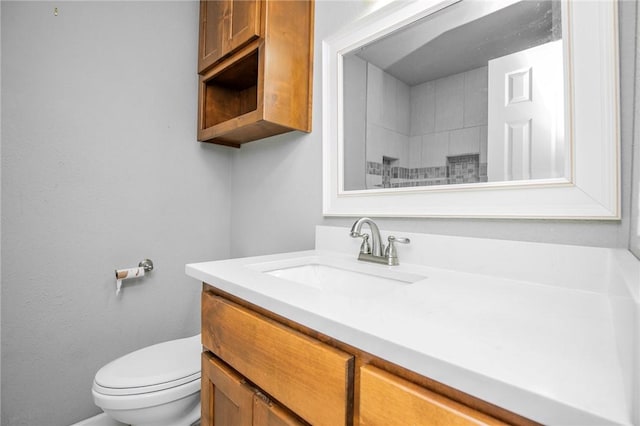 16 Stirling Ln, Bella Vista, AR 72715 - full bathroom featuring vanity, toilet, and a shower
