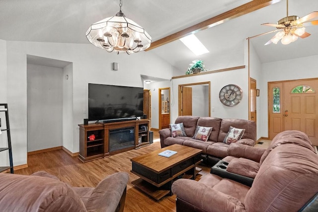 6 Portsmouth Ln, Bella Vista, AR 72715 - living area with wood finished floors, a chandelier, a ceiling fan, and baseboards
