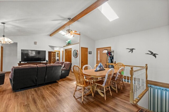 6 Portsmouth Ln, Bella Vista, AR 72715 - dining area featuring wood finished floors, a ceiling fan, and a skylight