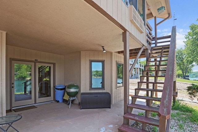 6 Portsmouth Ln, Bella Vista, AR 72715 - view of patio / terrace featuring stairs, french doors, and area for grilling
