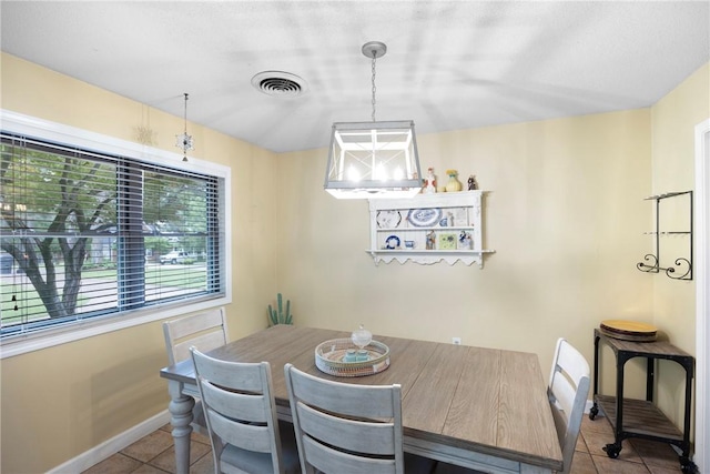 1433 Shalimar Cir, Russellville, AR 72802 - tiled dining space with baseboards