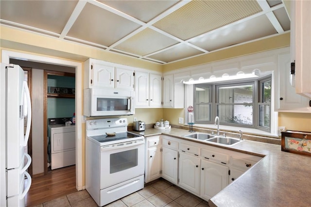 1433 Shalimar Cir, Russellville, AR 72802 - kitchen with white appliances, washer / clothes dryer, a sink, white cabinets, and coffered ceiling