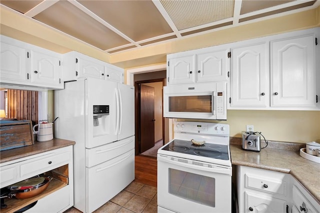 1433 Shalimar Cir, Russellville, AR 72802 - kitchen featuring white appliances, white cabinetry, light tile patterned floors, and light countertops