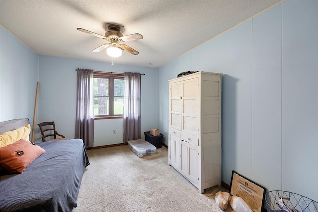 1433 Shalimar Cir, Russellville, AR 72802 - bedroom with light colored carpet, a ceiling fan, and a textured ceiling