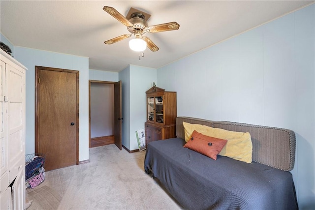 1433 Shalimar Cir, Russellville, AR 72802 - bedroom featuring light colored carpet, a ceiling fan, and baseboards
