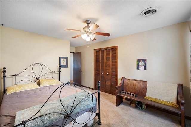 1433 Shalimar Cir, Russellville, AR 72802 - bedroom with a closet, carpet flooring, and a ceiling fan