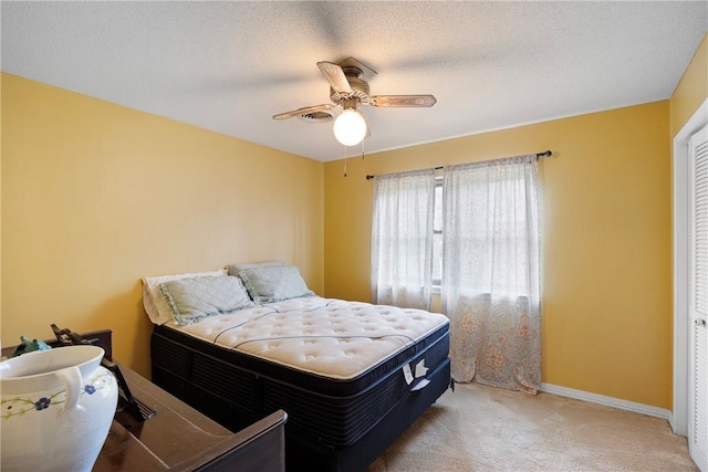 1433 Shalimar Cir, Russellville, AR 72802 - bedroom with carpet, baseboards, and a ceiling fan