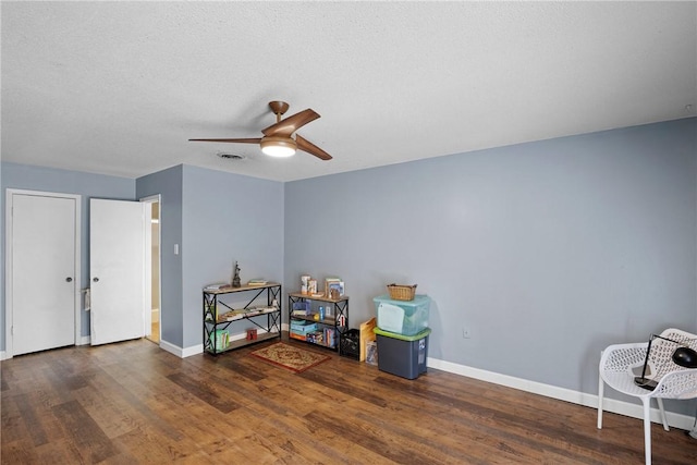 1433 Shalimar Cir, Russellville, AR 72802 - misc room featuring ceiling fan, wood finished floors, baseboards, and a textured ceiling