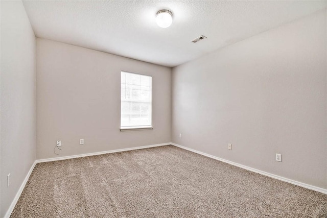 515 Jenkins Rd, Prairie Grove, AR 72753 - carpeted empty room featuring a textured ceiling and baseboards