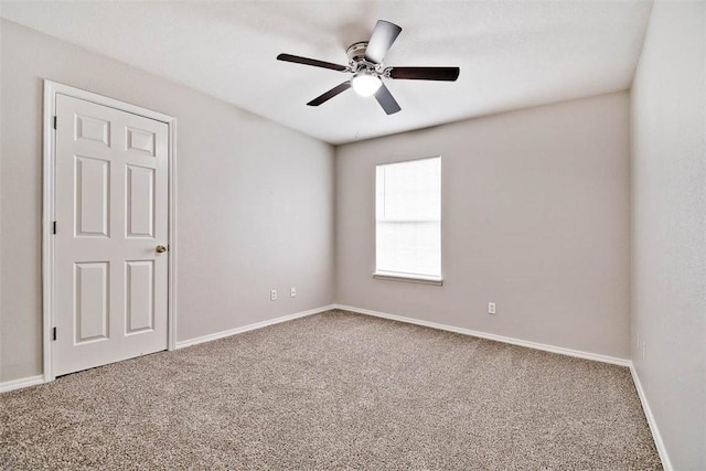 515 Jenkins Rd, Prairie Grove, AR 72753 - spare room featuring carpet, ceiling fan, and baseboards