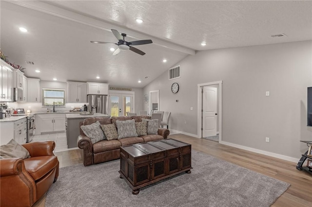 13865 State Highway 116, Colcord, OK 74338 - living room featuring light wood-type flooring, a ceiling fan, baseboards, and recessed lighting