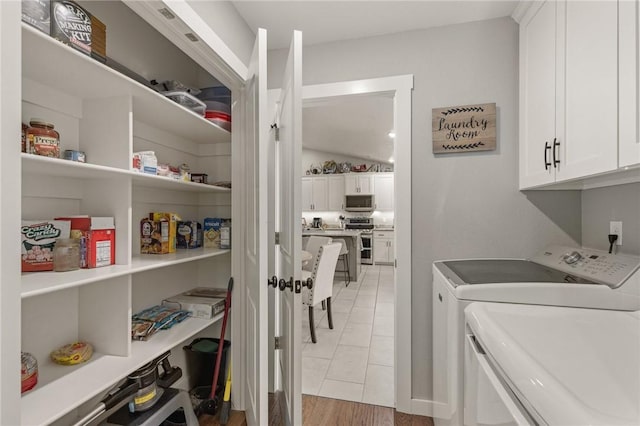 13865 State Highway 116, Colcord, OK 74338 - laundry area with washer and dryer and cabinet space